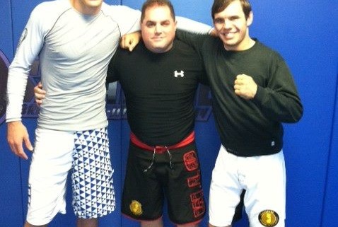 world champion Rafael Lovato Jr is already on his way to England, for the ADCC 2011. From Oklahoma City, Lovato made a stop in New Jersey, before crossing the ocean. As it was a long connection, Lovato took the opportunity to finish his training at a fellow GMA academy. He took on to the mats of Savarese BJJ, in Lyndhurst, NJ. He and his black belt Justin Rader was welcomed by black belt Chris Savarese. Lovato wrote about it and posted a picture: “Had a long layover in Jersey on my way to England and called up my East coast brother, Chris Savarese to take us to his mats. We had a great technical session and I had a blast hanging with the funniest guy I know. I can’t get enough of his stories and the accent to go with it is priceless! Thanks Sav!”