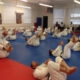 Students and teachers in BJJ